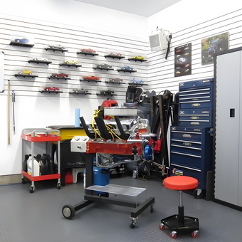 Organized garage with tool cabinets and model cars - Tepot from Shediac, NB