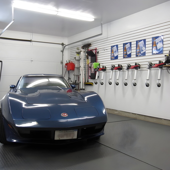 Organized garage with blue classic car and tool storage - Tepot from Shediac, NB