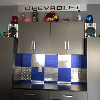 Garage Cabinets with Diamond Plate Backsplash and Chevrolet Sign - Kevin from Kissimmee, Florida