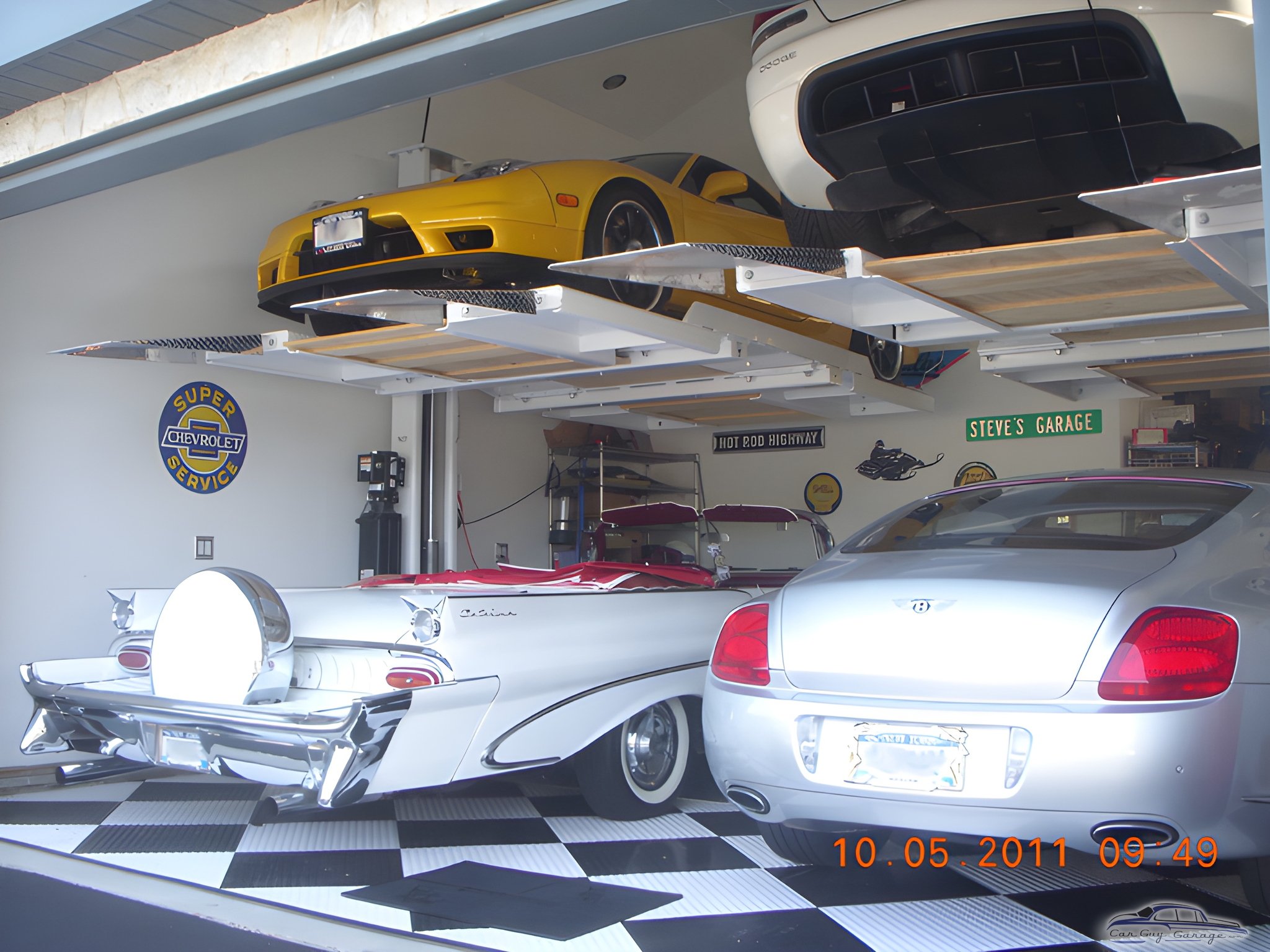Luxury Cars on Garage Lifts with Retro Signs - Steve from Smithtown, NY