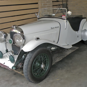 Classic white roadster with wire wheels in garage - oldcar from East Doncaster, Victoria