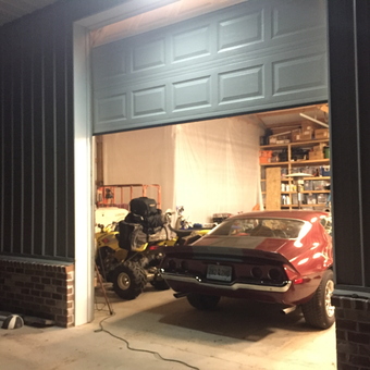 Classic Car, ATV, and Shelving in Organized Garage - Seth from Sumter, SC