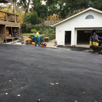 Fresh Asphalt Driveway with Detached White Garage - Pappabob from St. Helena, California