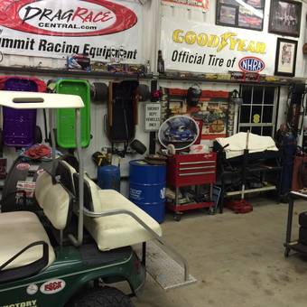 Garage with tool chest, go-karts, and wall decor - Mike from Palmer, Texas