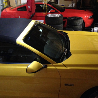 Garage With Yellow Convertible, Red Car, and Tire Stacks - WHYKNOTLF11 from Novi, MI