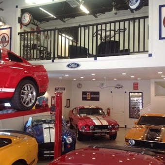 Classic Mustang Garage with Wall Signs and Car Lift - Mitch from Highlands Ranch, CO