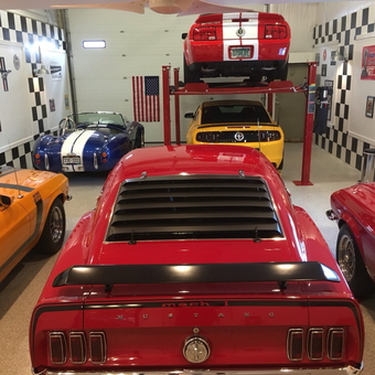 Classic Mustang Garage with Car Lift and Wall Displays - Mitch from Highlands Ranch, CO