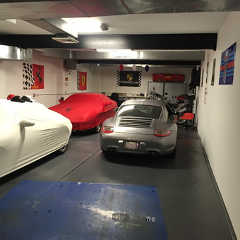 Garage with Porsche, Covered Cars, and Racing Decor - Eli from Great Neck, NY