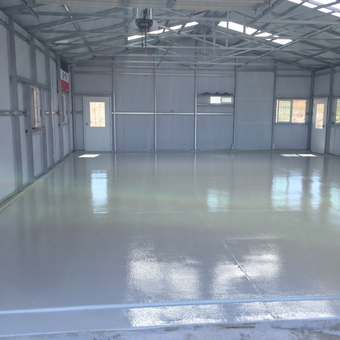 Clean epoxy coated metal garage interior with windows - Mike from Paso Robles, CA