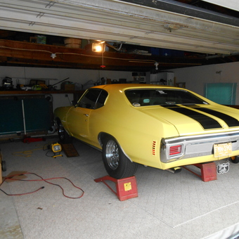 Classic Yellow Muscle Car on Ramps in Garage - Guelph, Ontario