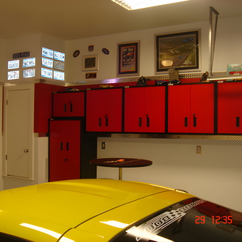 Red Garage Wall Cabinets and Decor with Yellow Car - Joe from Ft. Worth, TX