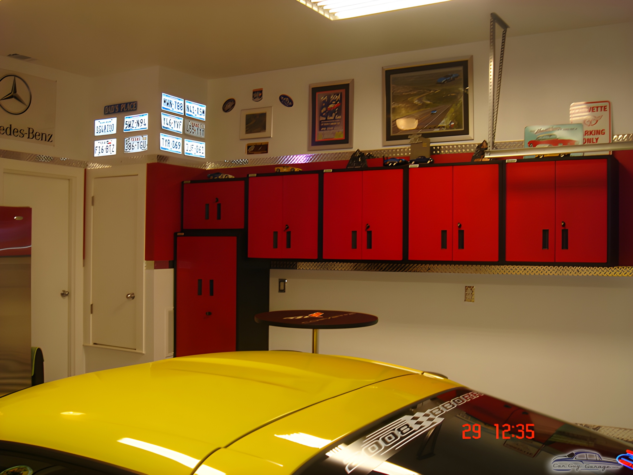 Red Garage Wall Cabinets and Decor with Yellow Car - Joe from Ft. Worth, TX