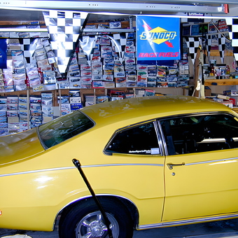 Yellow Classic Car in Decorated Garage with Sunoco Banners - Drew Hierwarter from Kingsport, Tennessee