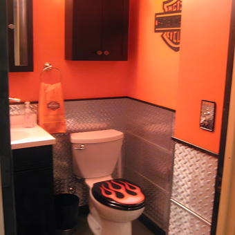 Harley-themed garage bathroom with diamond plate walls - Saul from Saint Louis, MO