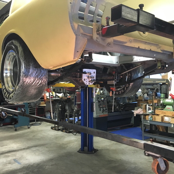 Classic Car on Lift with Racing Tires in Garage - John from Monterey, California