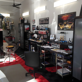 Organized garage with car lift, cabinets, and decor - dan Lawson from Blountville, Tennessee
