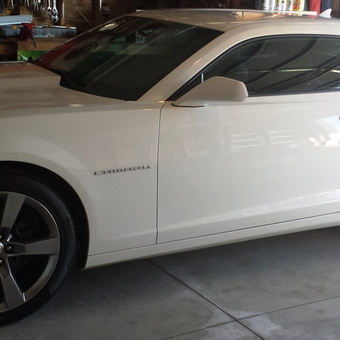 White Camaro in organized garage with tools - Grrrowl from Zeeland, Michigan