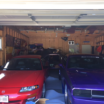 Garage with Red and Purple Cars, Unfinished Walls - Larry from Janesville, WI