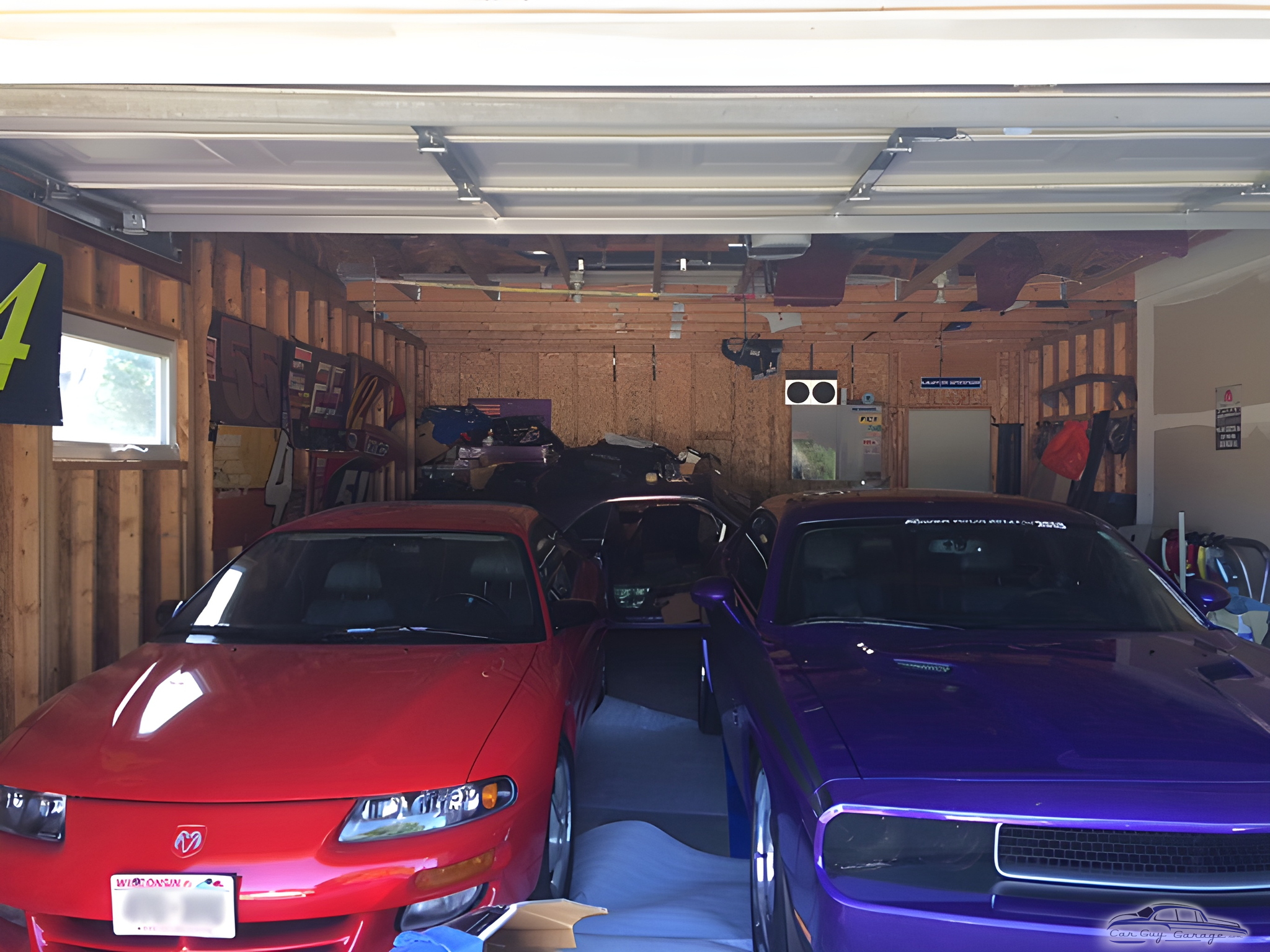 Garage with Red and Purple Cars, Unfinished Walls - Larry from Janesville, WI
