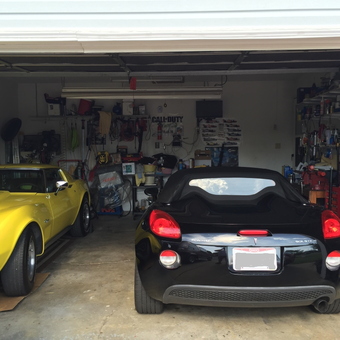 Organized garage with classic cars and tool storage - Geo's from Sidney, Ohio