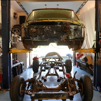 Classic car body on lift with rolling chassis - Chelle from Shelby, North Carolina