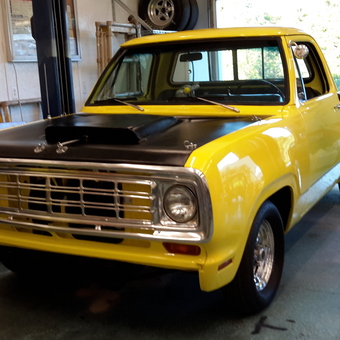 Yellow classic pickup truck on lift in garage - Chelle from SHELBY, North Carolina