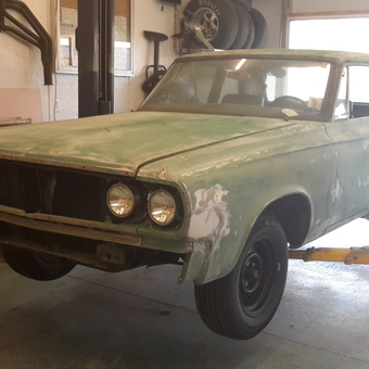 Classic car restoration on lift in organized garage - Chelle from SHELBY, North Carolina