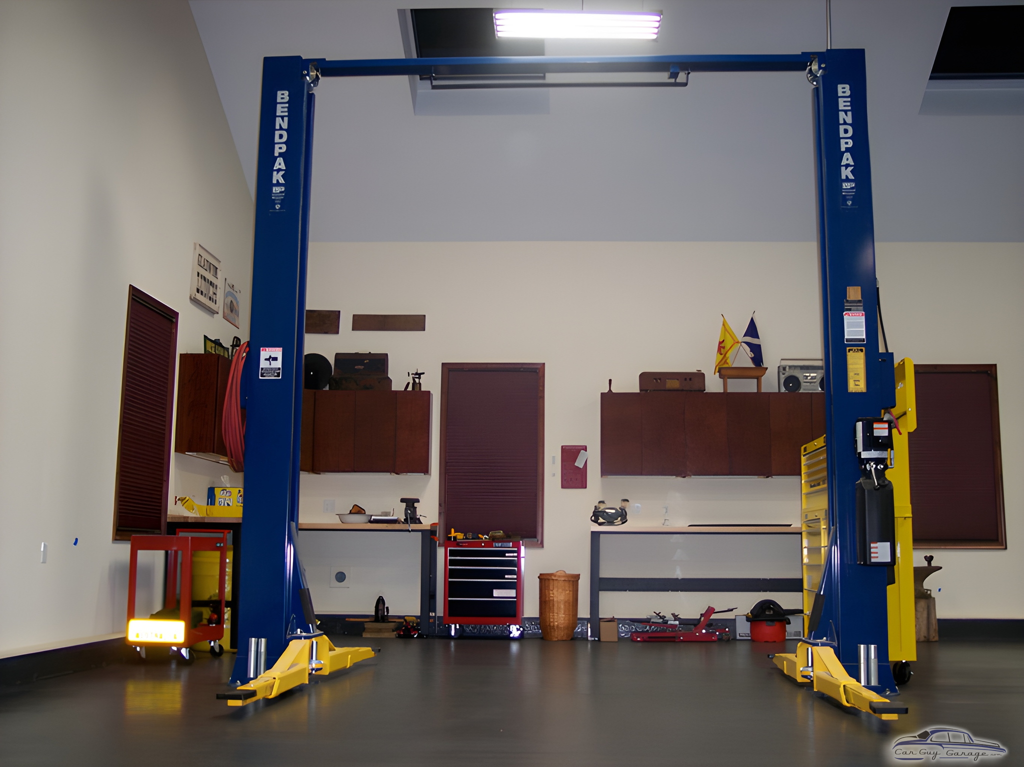 Organized garage with BendPak car lift and tool storage - Joseph from Glen Mills, PA