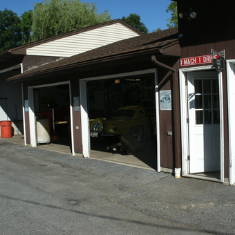 Three bay garage with classic cars and Mach 1 sign - Kevin427 from SLATINGTON, Pennsylvania