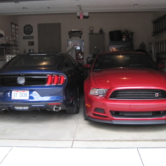 Two Mustangs in Organized Garage with Wall Storage - Raja from Barberton, oh