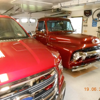 Classic and Modern Red Trucks in Organized Garage - Hairs from Lehighton, PA