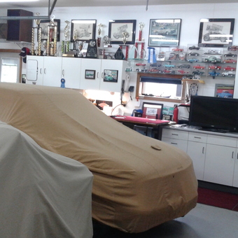 Organized garage with car covers and storage cabinets - Pat Jackson from Johnstown, Ohio