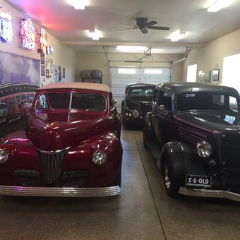 Classic cars with neon garage signs and wall decor - cmac from Folsom, Ca.