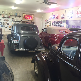 Classic Cars, Neon Signs, and Trophies in Garage - cmac from Folsom, Ca.