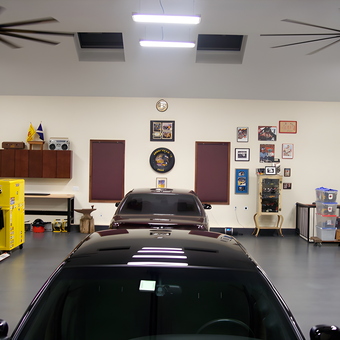 Organized garage with car lift and storage cabinets - Joseph from Glen Mills, PA