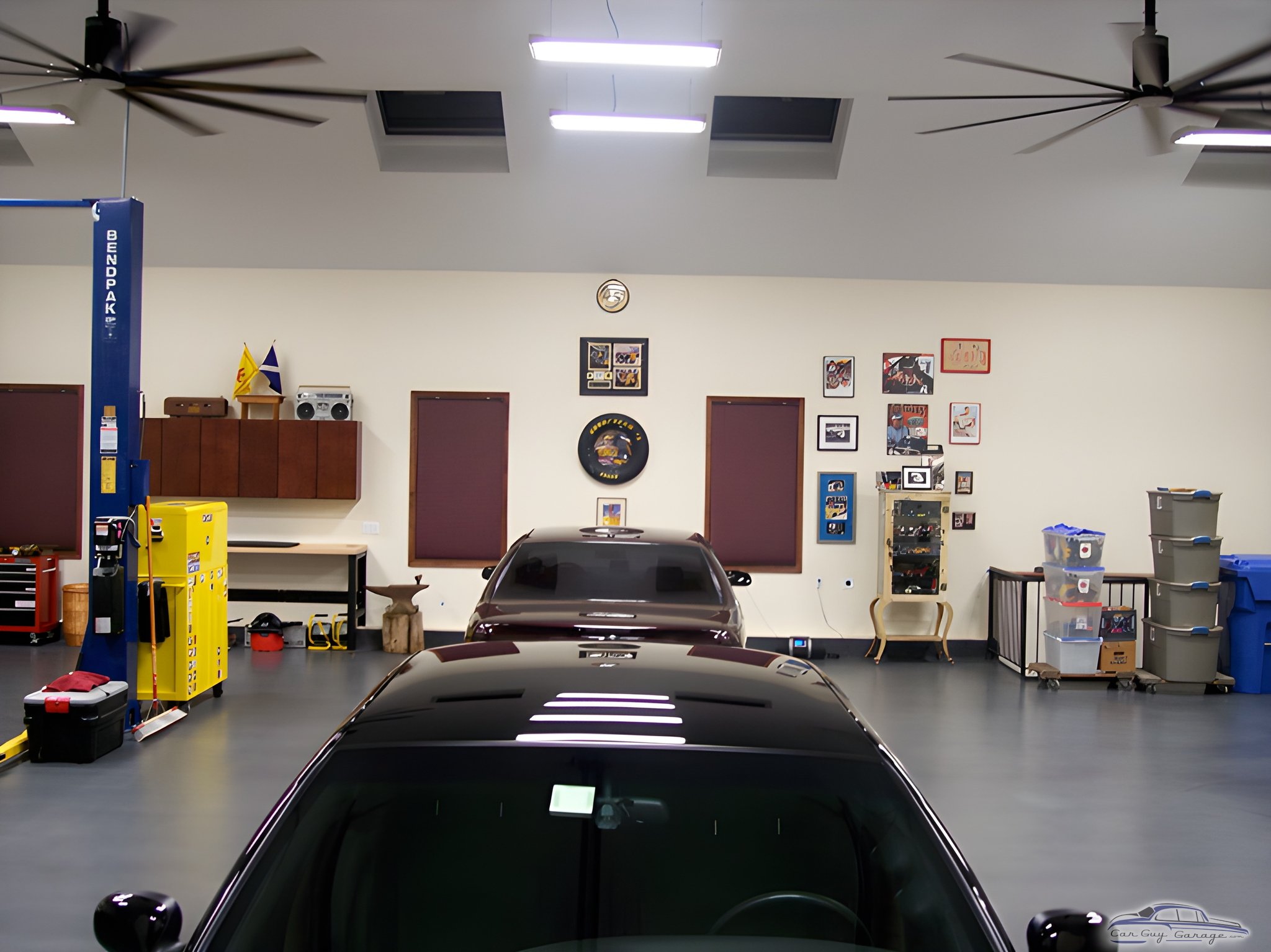 Organized garage with car lift and storage cabinets - Joseph from Glen Mills, PA