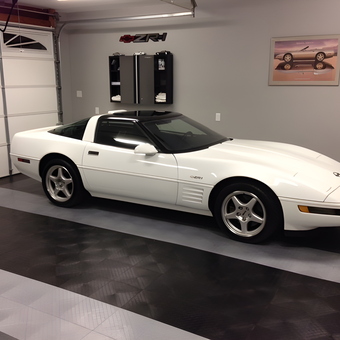 Clean garage with white Corvette and wall cabinets - Jeff from Pasadena, Maryland