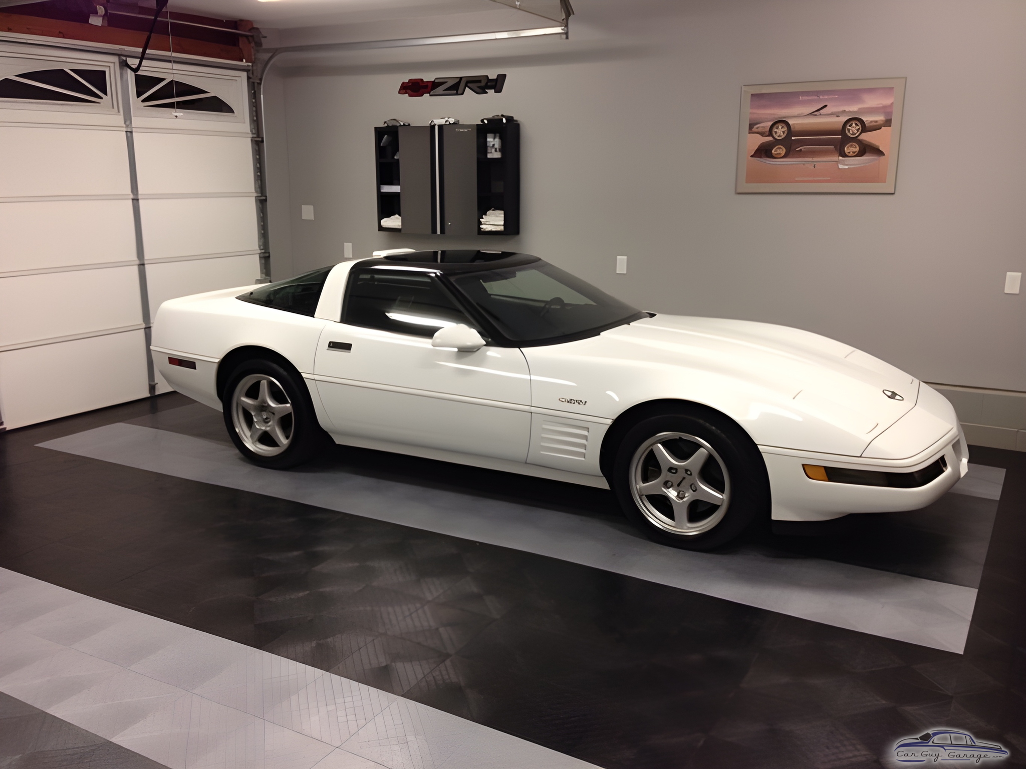 Clean garage with white Corvette and wall cabinets - Jeff from Pasadena, Maryland