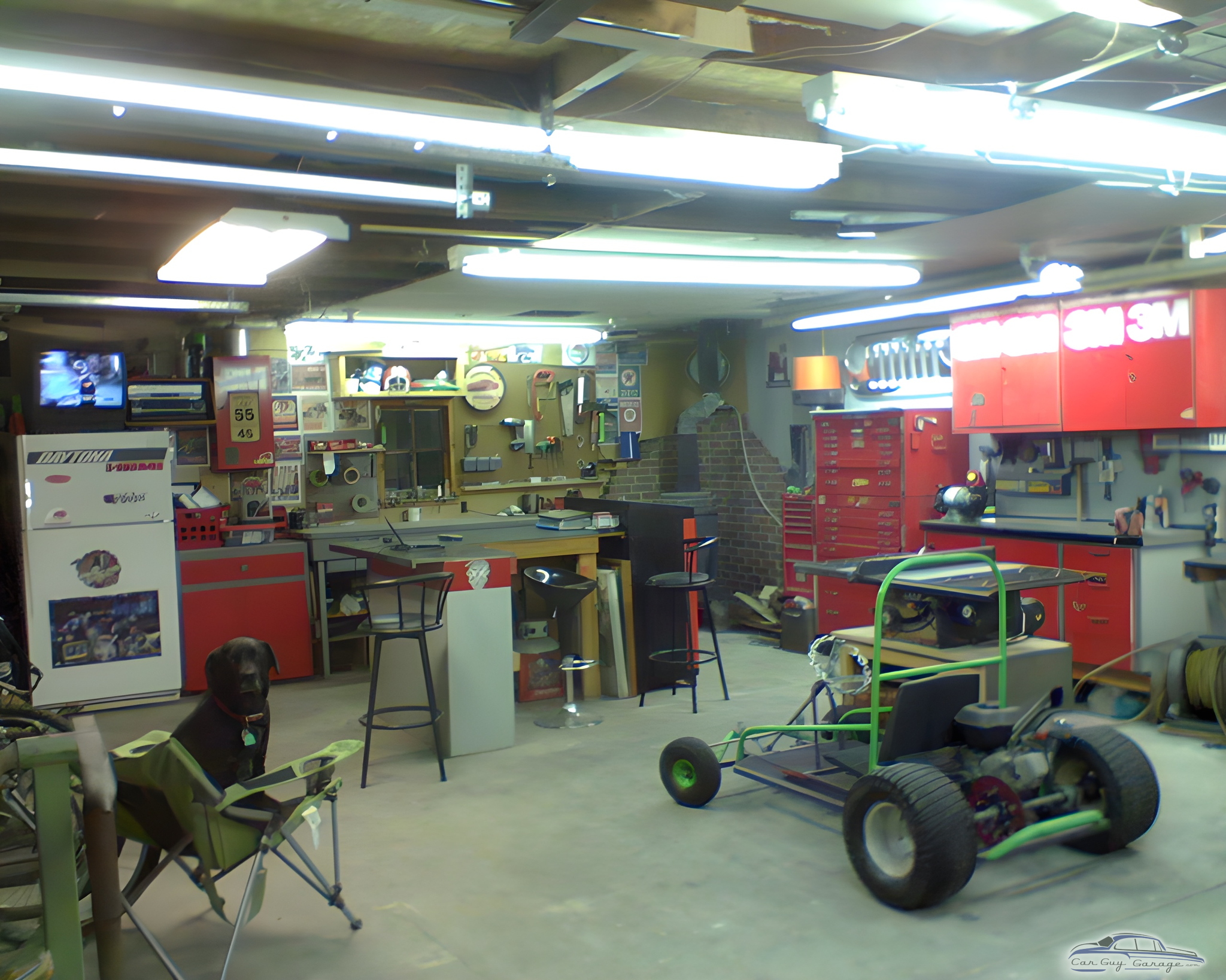 Organized garage with tool chests and go-kart - Carsabbott from Great Bend, KS