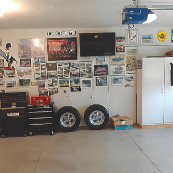 Organized garage with tool chests, wall art, and cabinets - Rich K from N Royalton, OH
