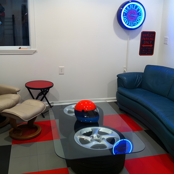 Garage lounge with Harley sign and tire table - Fotoab from Fairport, NY