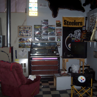 Garage with jukebox, Steelers decor, and lounge chairs - Fred from Homer, Alaska