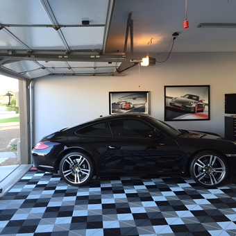 Modern garage with Porsche, wall art, and tile floor - tdz from Mesa, AZ