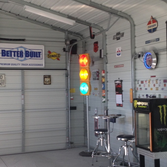 Garage with Traffic Light, Bar Stools, and Signs - Big Guy from Pahrump, Nevada