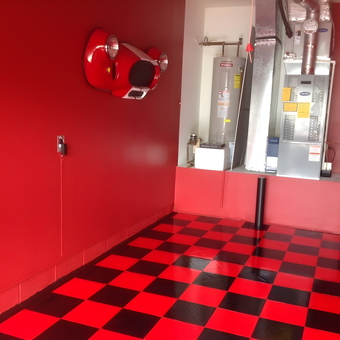 Red and Black Checkered Garage Floor with Wall Decor - Manchester, NJ