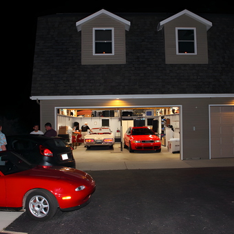Spacious garage with red sports cars and storage - David from Plymouth, MI
