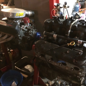 Garage engine rebuild setup with tools and stands - Craig from Russellville, Kentucky