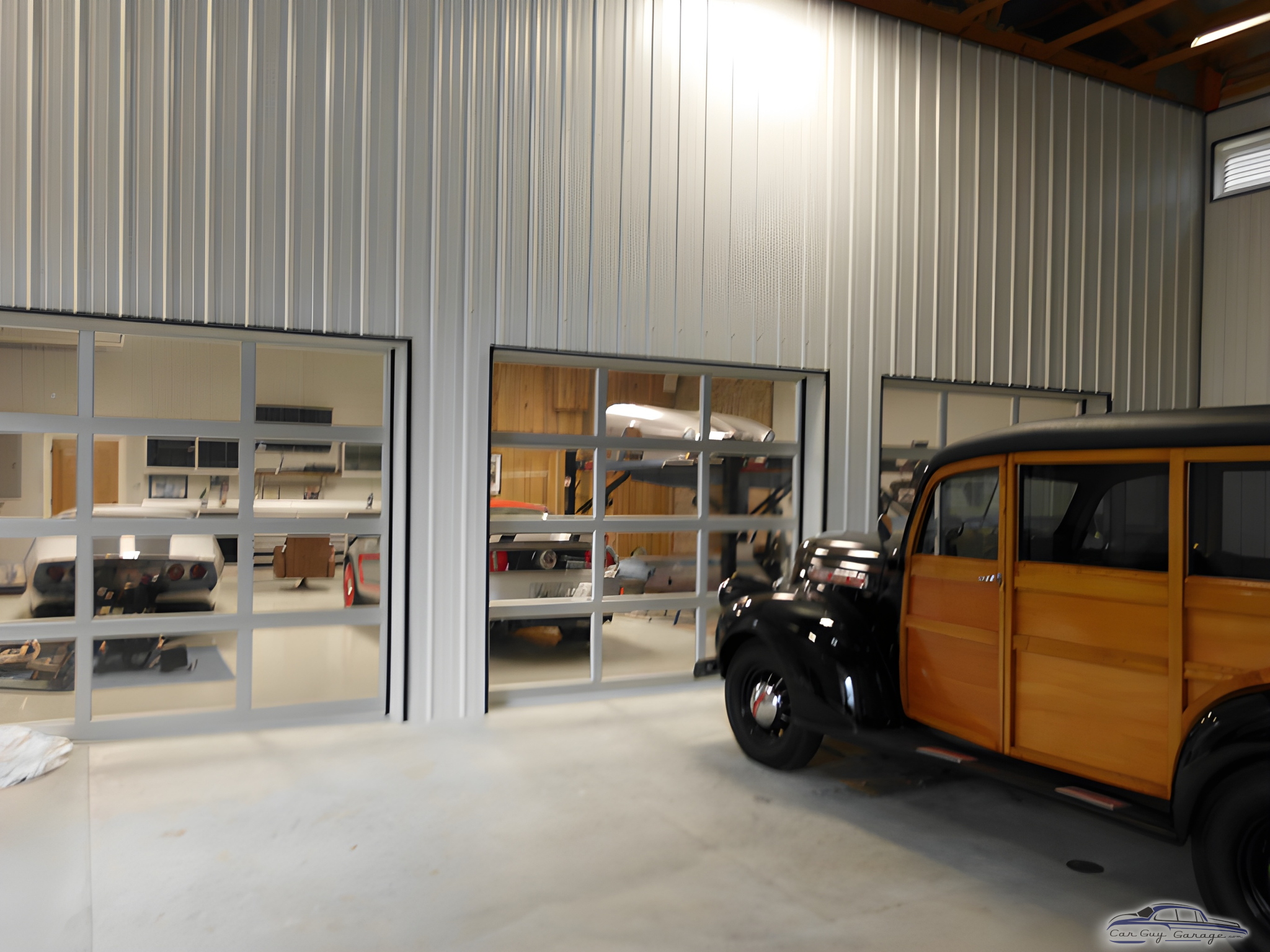 Classic Car Garage with Glass Doors and Metal Walls - Louis from Bourg, LA