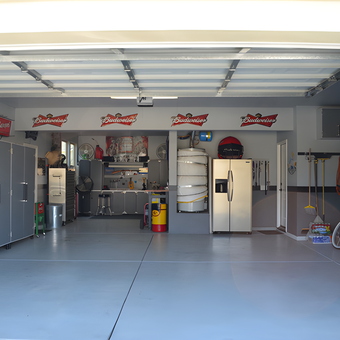 Organized garage with cabinets, bar, and decor - Rod from Lake Elsinore, CA