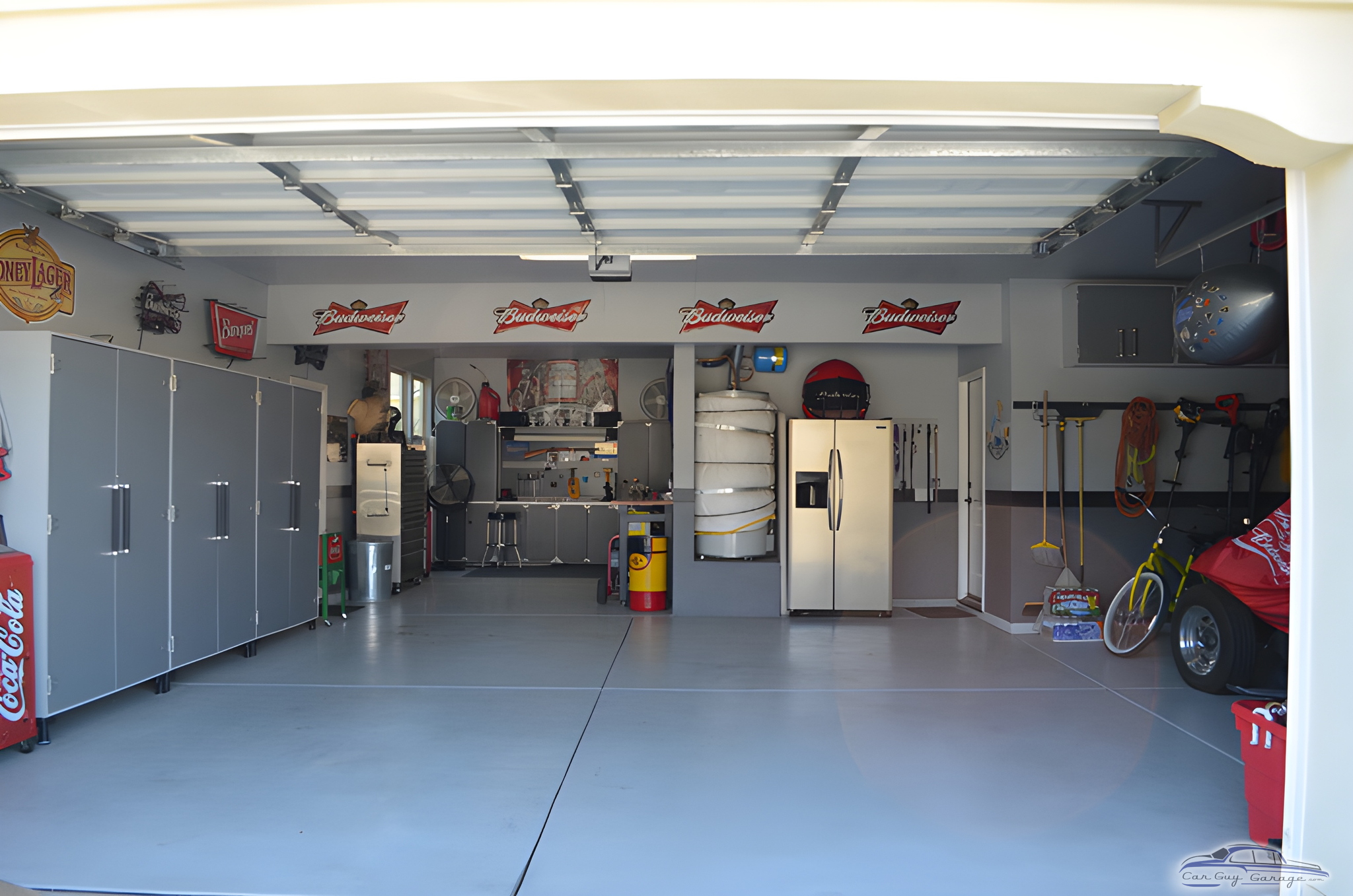 Organized garage with cabinets, bar, and decor - Rod from Lake Elsinore, CA